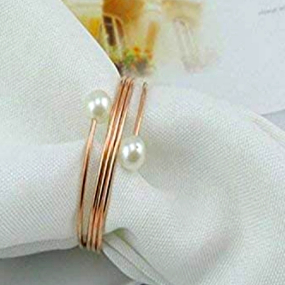 6 rose gold and pearl napkin holders